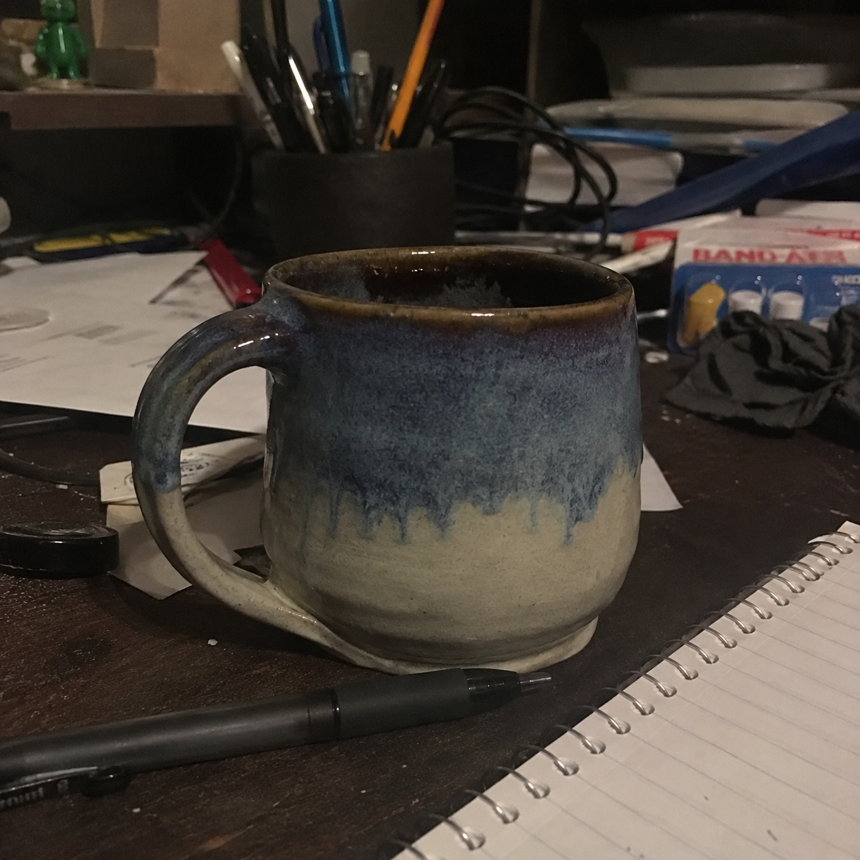 Before — mug on cluttered background